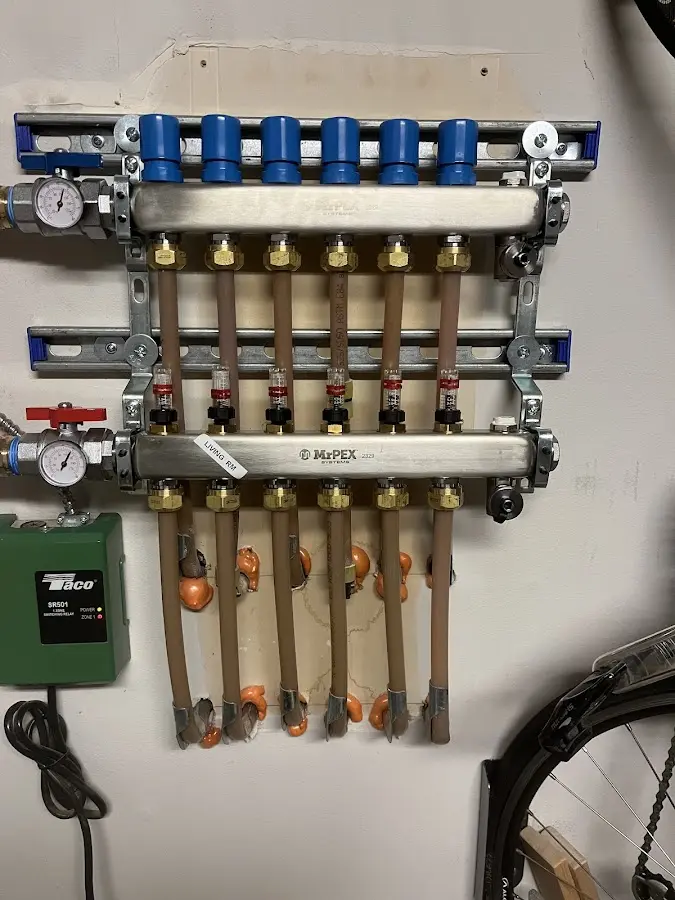 Plumber performing Gas Leak Detection at a residential property in Hudson Falls